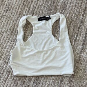 PrettyLittleThing Cream Racerback Crop Top